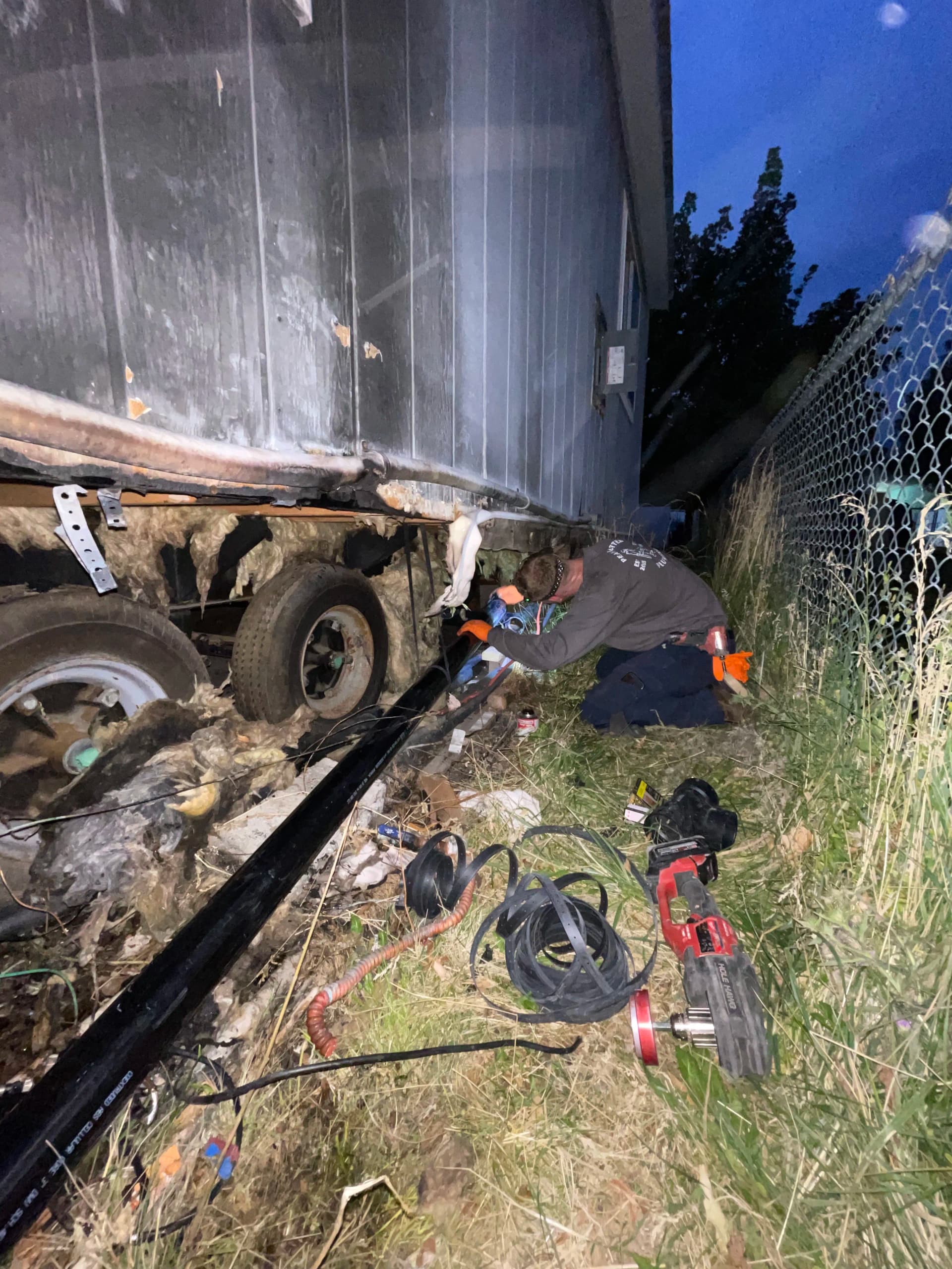 Gallery photos for Sewer and Water Main Repair Under a Fire-Damaged Trailer in Salt Lake: Image #2